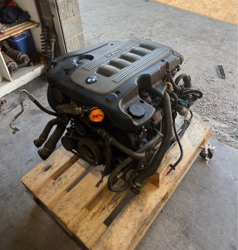 BMW M57 engine stored on pallet before installation